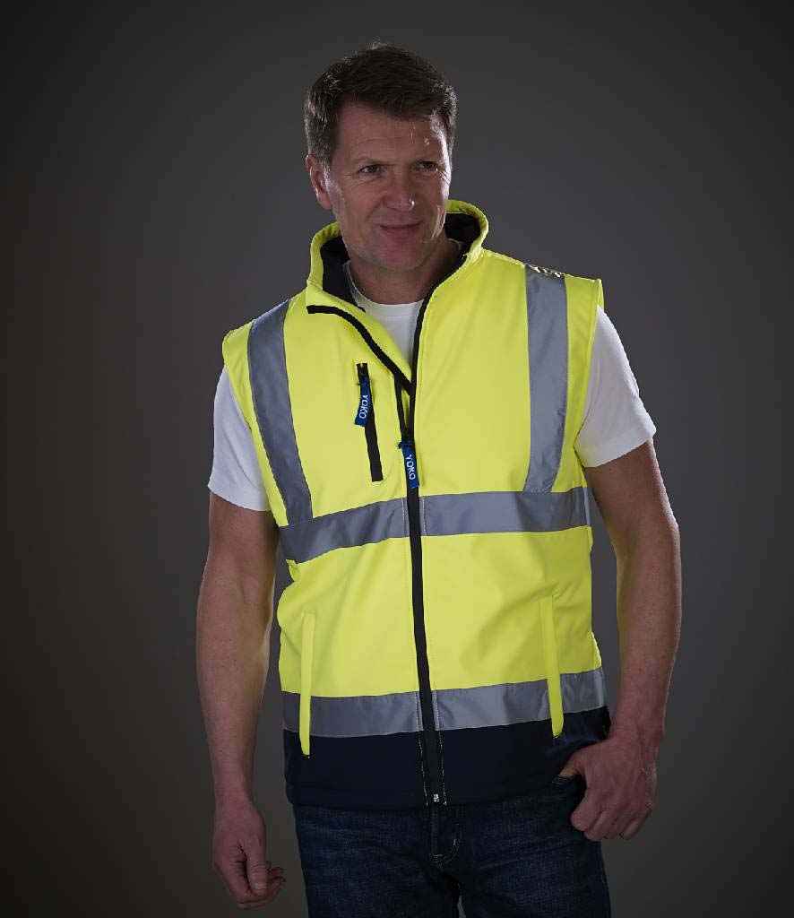 Yoko Hi-Vis Soft Shell Gilet in Yellow Navy by Yoko — Custom branded clothing by Print Press, featuring premium embroidery produced in our specialist print lab in the UK.