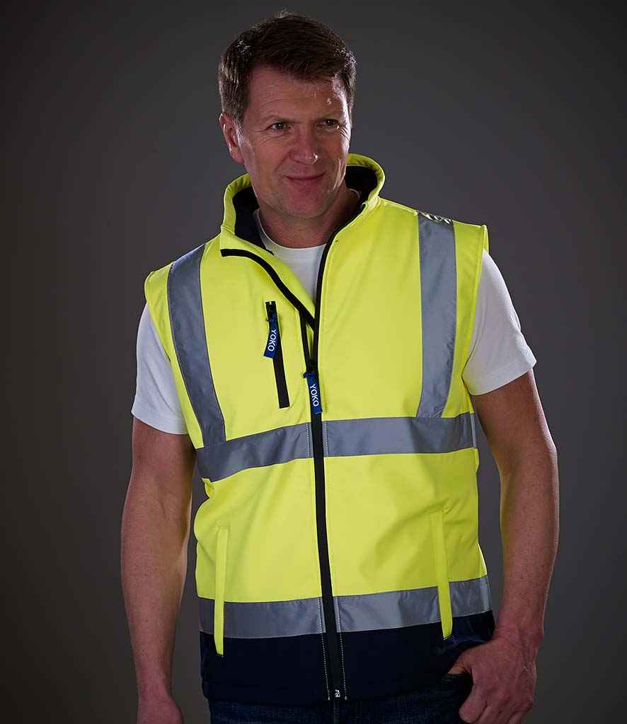 Yoko Hi-Vis Soft Shell Gilet in by Yoko — Custom branded clothing by Print Press, featuring premium embroidery produced in our specialist print lab in the UK.
