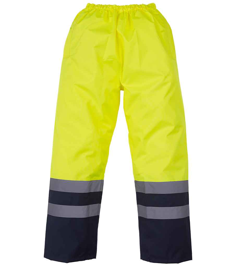 Yoko Hi-Vis Two Tone Waterproof Overtrousers in Yellow Navy by Yoko — Custom branded clothing by Print Press, featuring premium embroidery produced in our specialist print lab in the UK.
